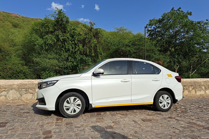 From Jaipur: Private Transfers Cab To Sawai Madhopur Hotel drop - On the Road: AC Comfort, Luggage Space, and Real Timing
