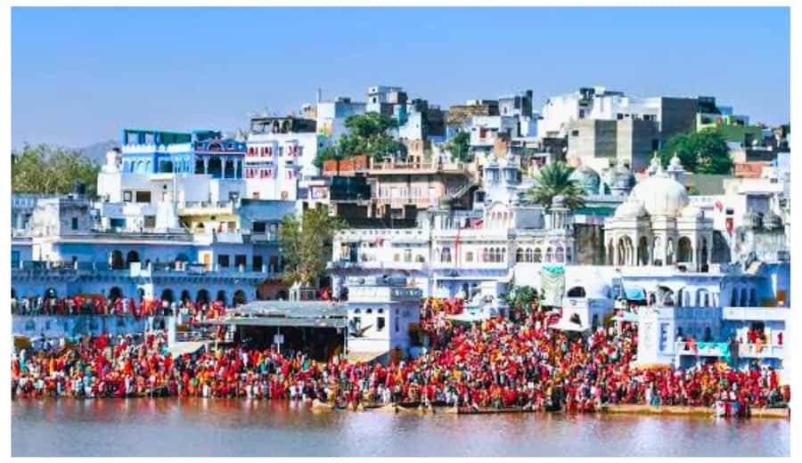 Jaipur: Ajmer & Pushkar Day Trip with Lunch & Camel ride - Pushkar Lake ghats: where pilgrims gather and 52 steps matter