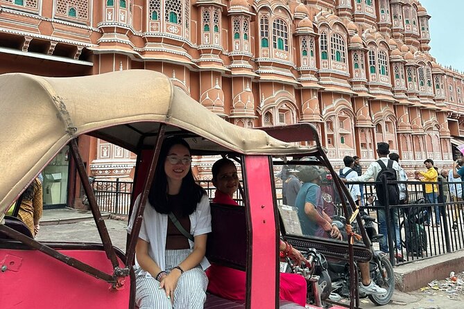 Jaipur Half-Day Heritage Tour by Women-Driven E-Rickshaw - Hawa Mahal, the wind-tower facade in real time